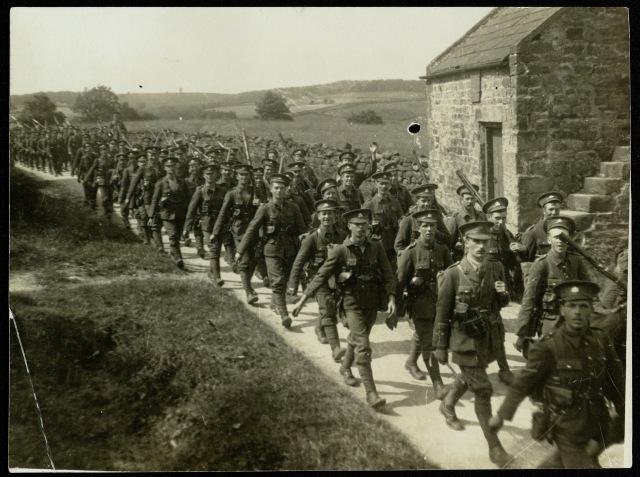 Line of soldiers marching on a country lane, 1915